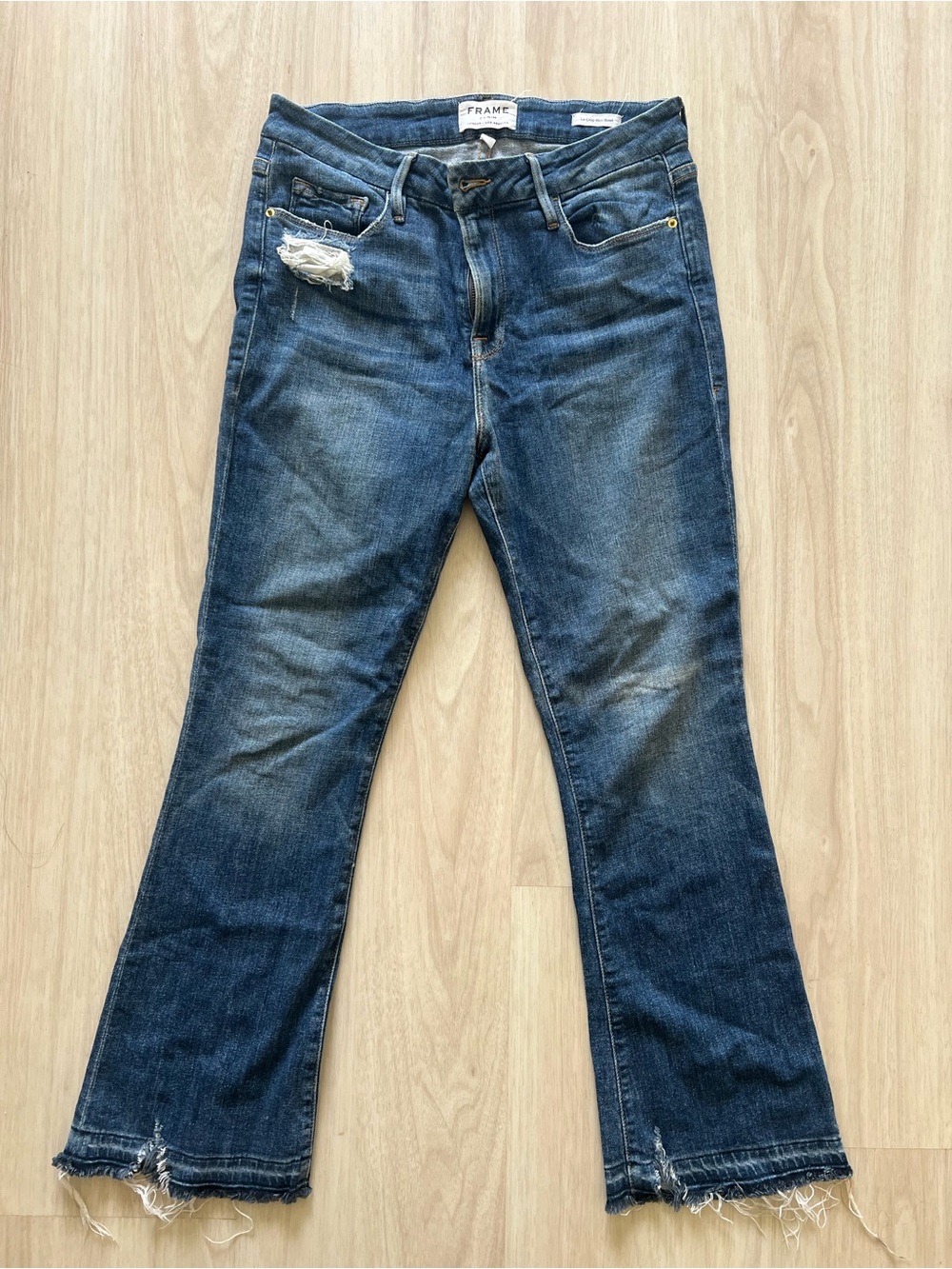 Frame Denim Dark Blue Flare Jeans with Distressed Detail
